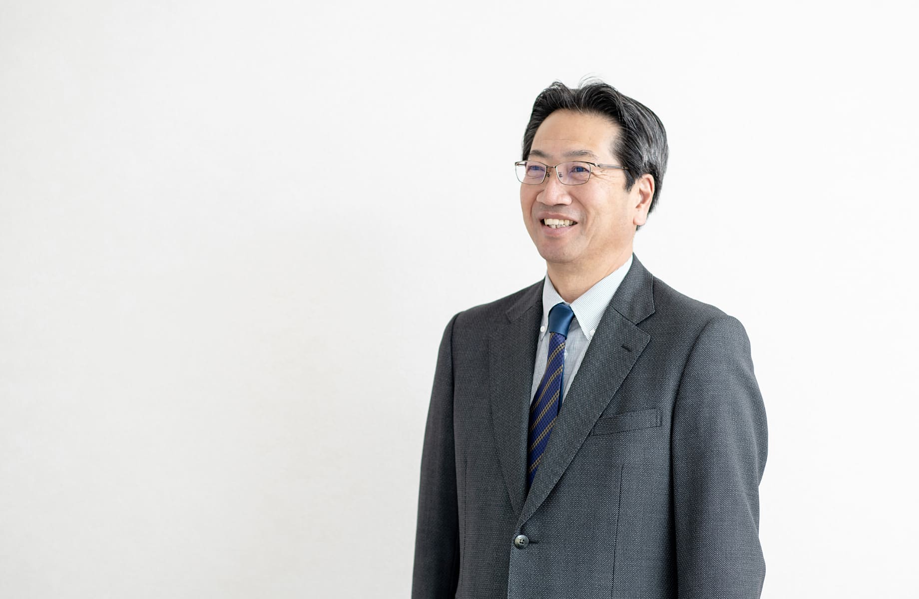 代表取締役　岡部 一浩